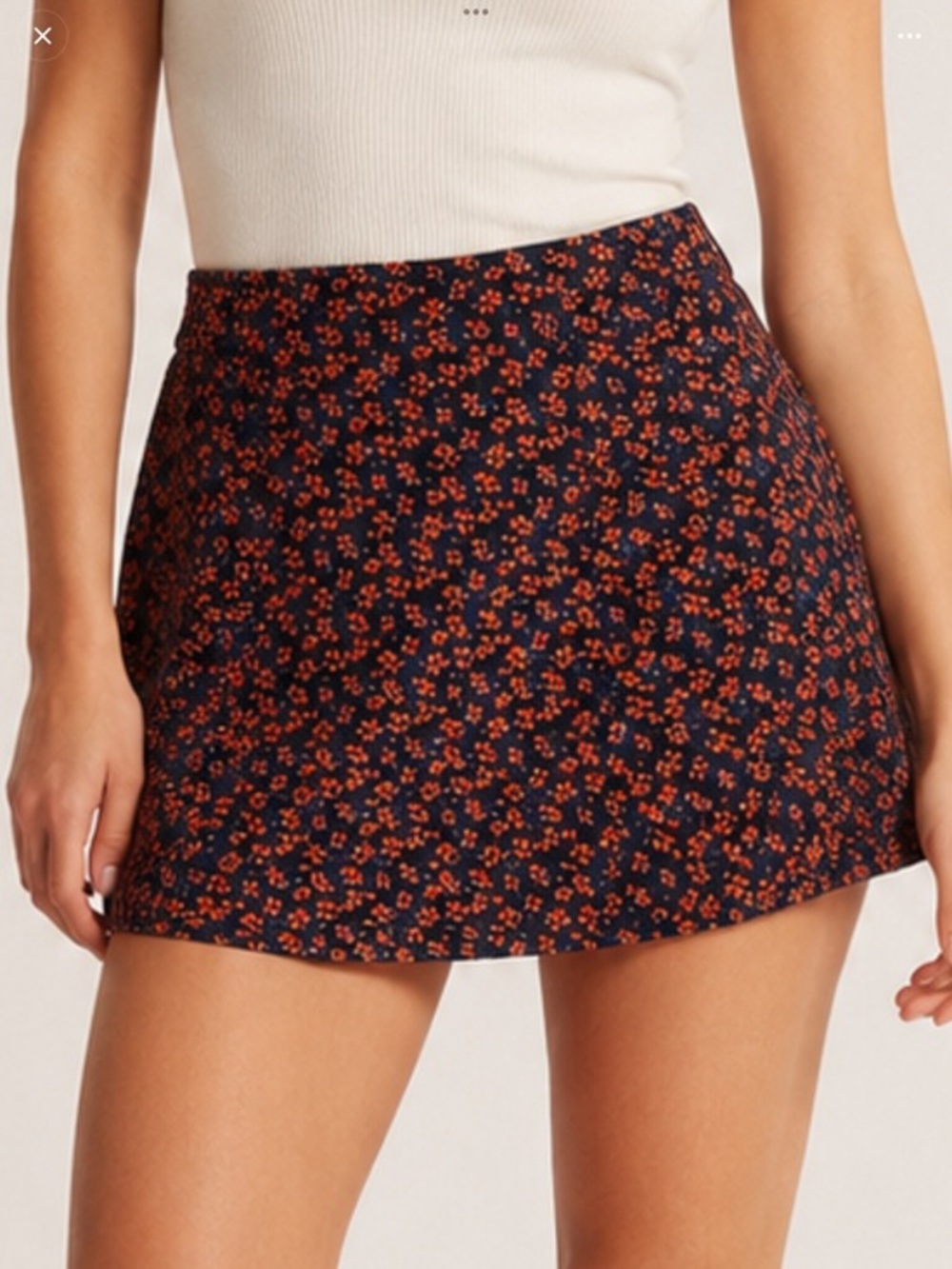 Floral navy and red summer mini flirty skirt in size Large
